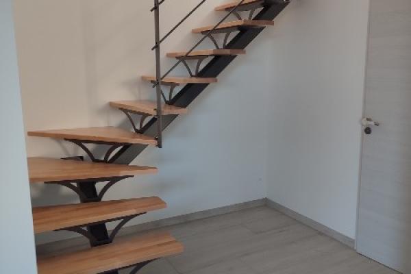 Réalisation d'un escalier quart tournant avec ses garde-corps métal bois à Champtoceaux