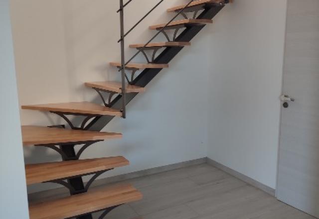 Réalisation d'un escalier quart tournant avec ses garde-corps métal bois à Champtoceaux