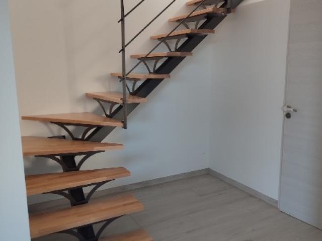 Réalisation d'un escalier quart tournant avec ses garde-corps métal bois à Champtoceaux